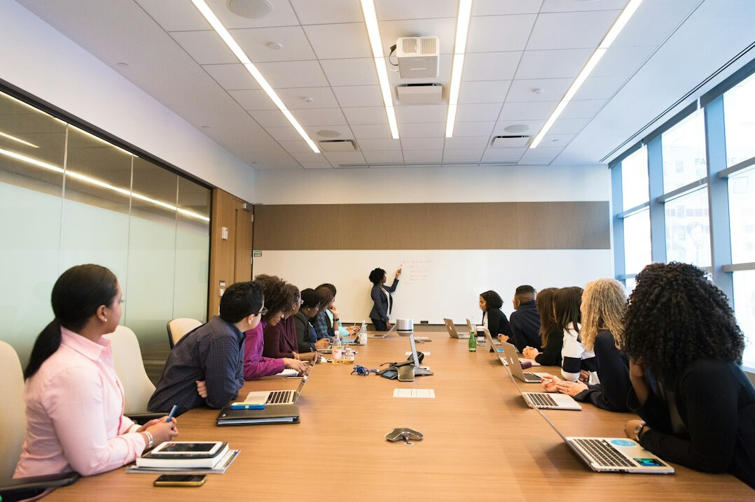 team discussion in boardroom