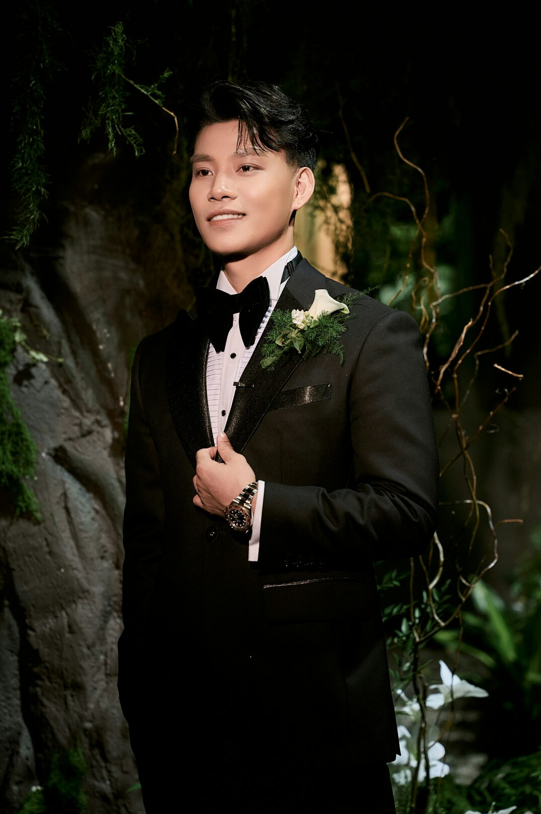 Portrait of a smiling man in a dark suit